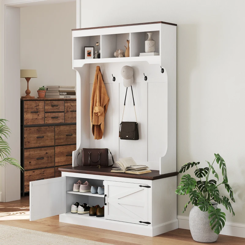 Stylish entryway with white hall tree, hooks, storage bench, shoe rack, and cabinet.