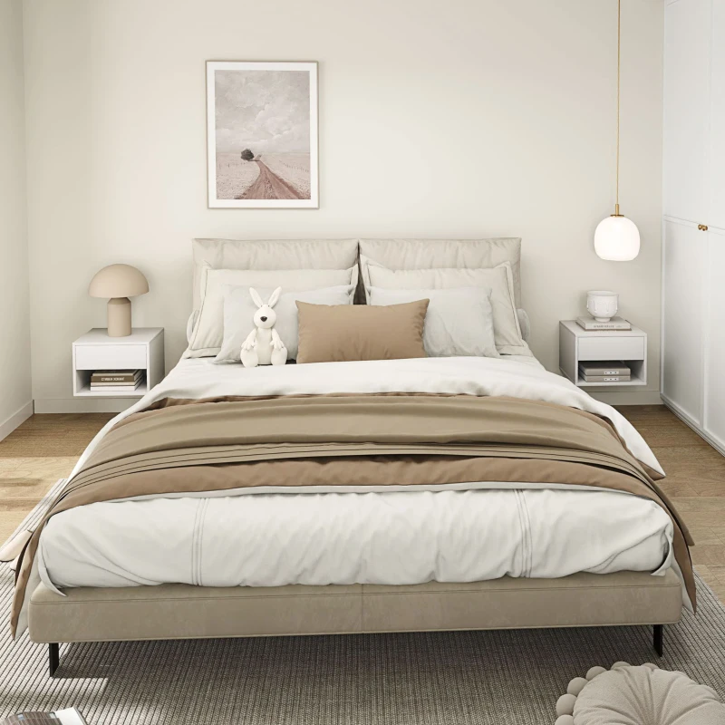 Minimalist bedroom with wall-mounted white nightstands on each side of the bed, styled with lamp and décor.