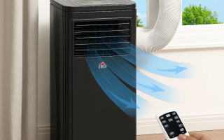 Black portable air conditioner blowing cool air with remote.
