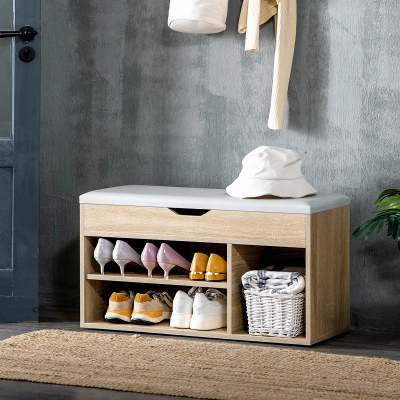 Wooden shoe bench with cubbies, baskets, and cushioned seat for entryway organization.