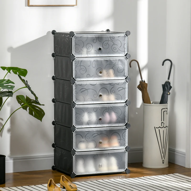 Metal tiered shoe rack organizing various footwear.