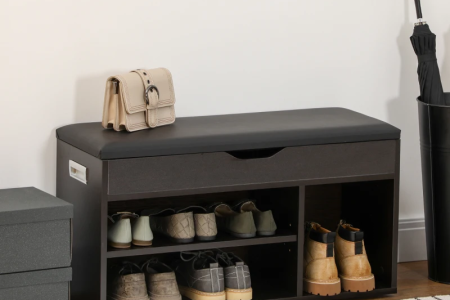 Organized shoe rack with boots, shoes, and accessories.