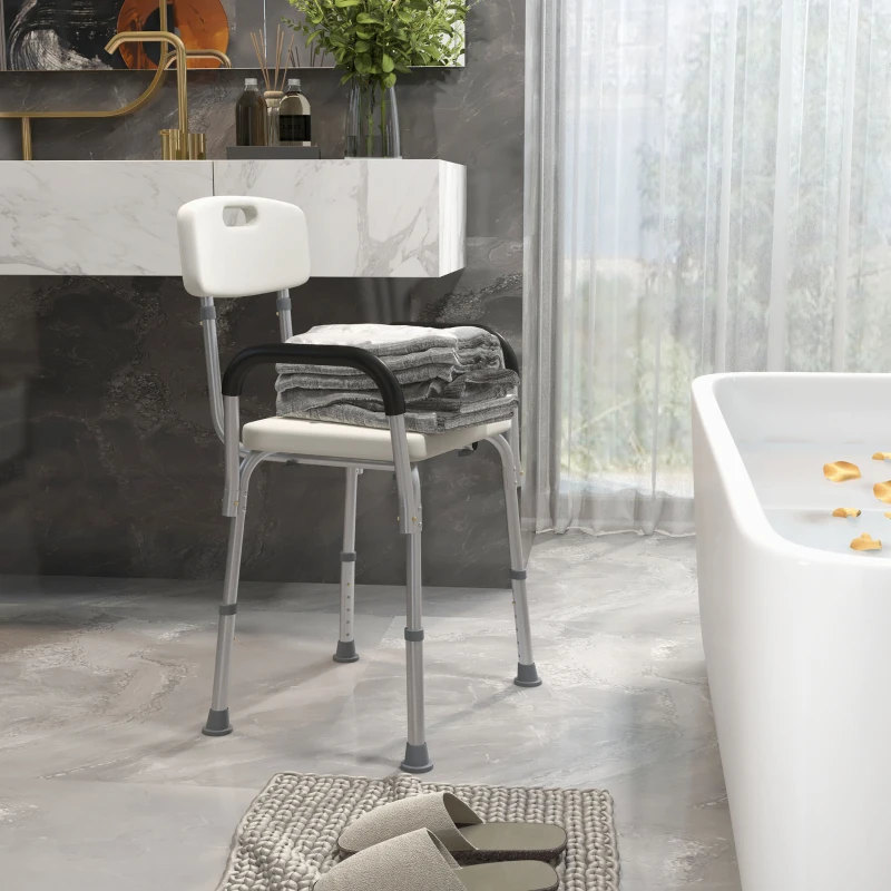 Rolling shower wheelchair placed next to a bed.