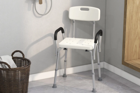 Shower chair setup with adjustable height and safety features.