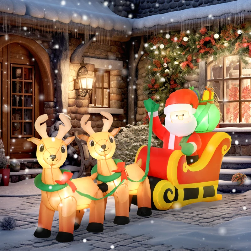 Inflatable Santa in sleigh with two reindeer in snowy yard.
