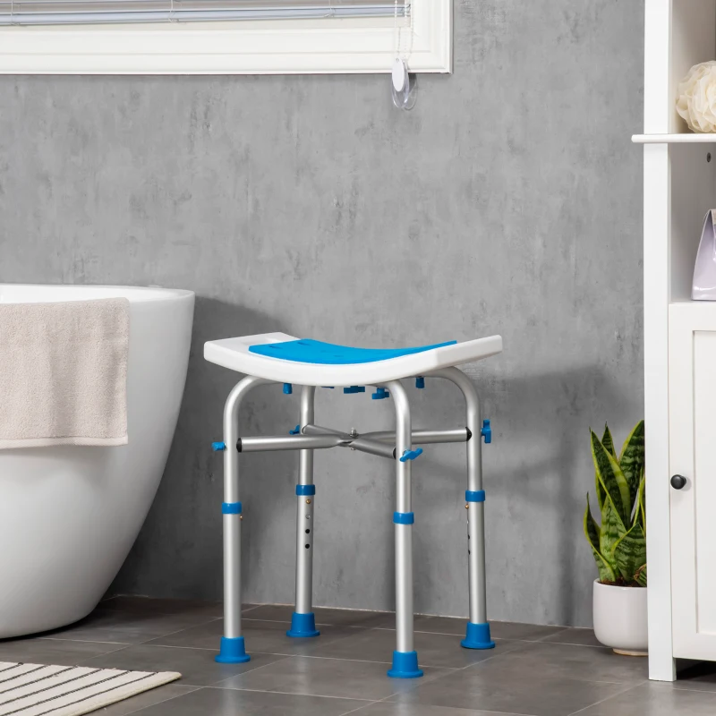 Compact blue padded shower stool on bathroom floor