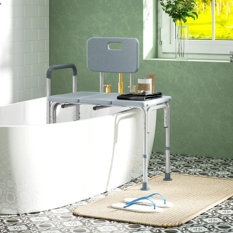 Bath transfer bench positioned across bathtub edge