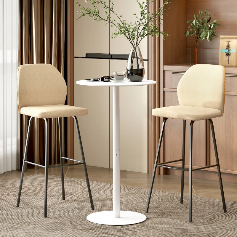 Small round bar table with two beige upholstered stools