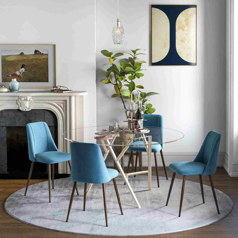 Glass round dining table with blue upholstered chairs