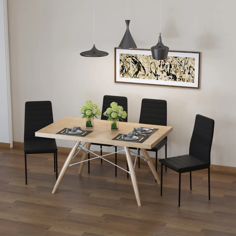 Modern dining table with black cushioned upholstered chairs