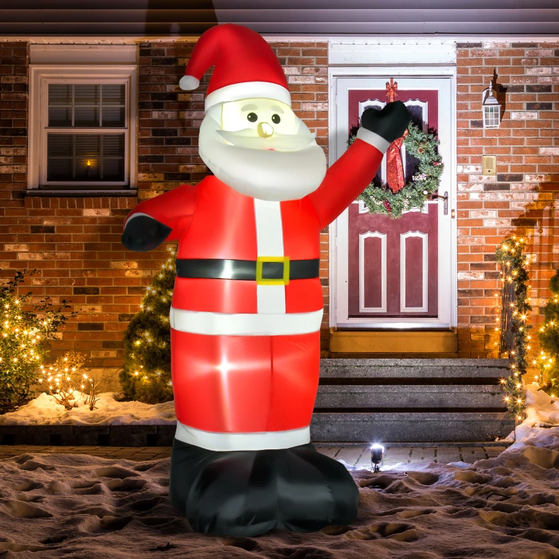 Inflatable Santa glowing outdoors with Christmas lights at night.