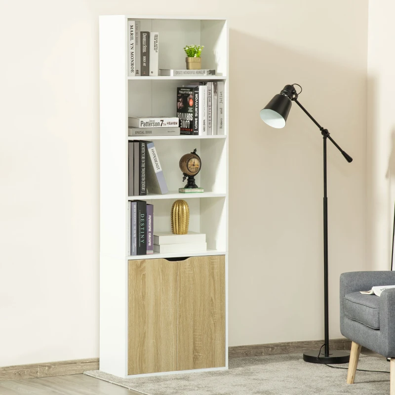Tall white bookshelf with wood cabinet bottom beside floor lamp.