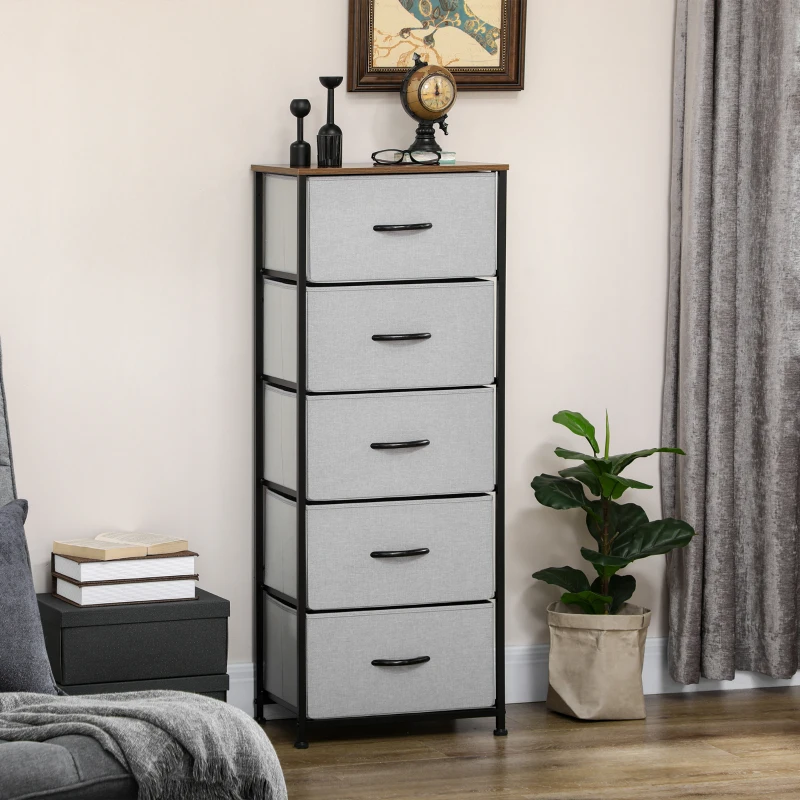 Tall fabric drawer dresser with six compartments beside bed.