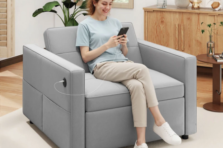 Gray reclining chair bed with USB ports in living room.