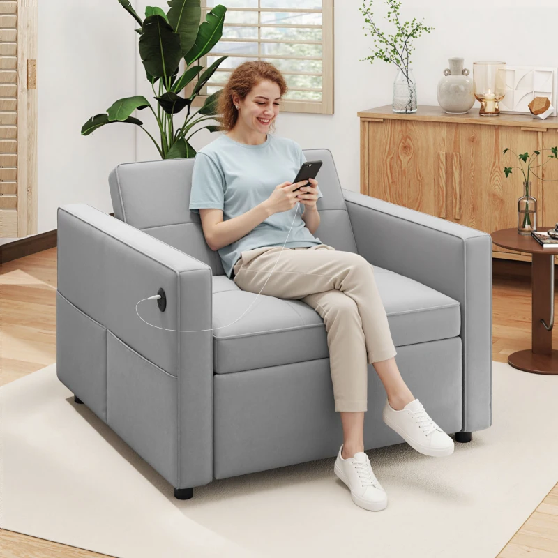 Gray reclining chair bed with USB ports in living room.