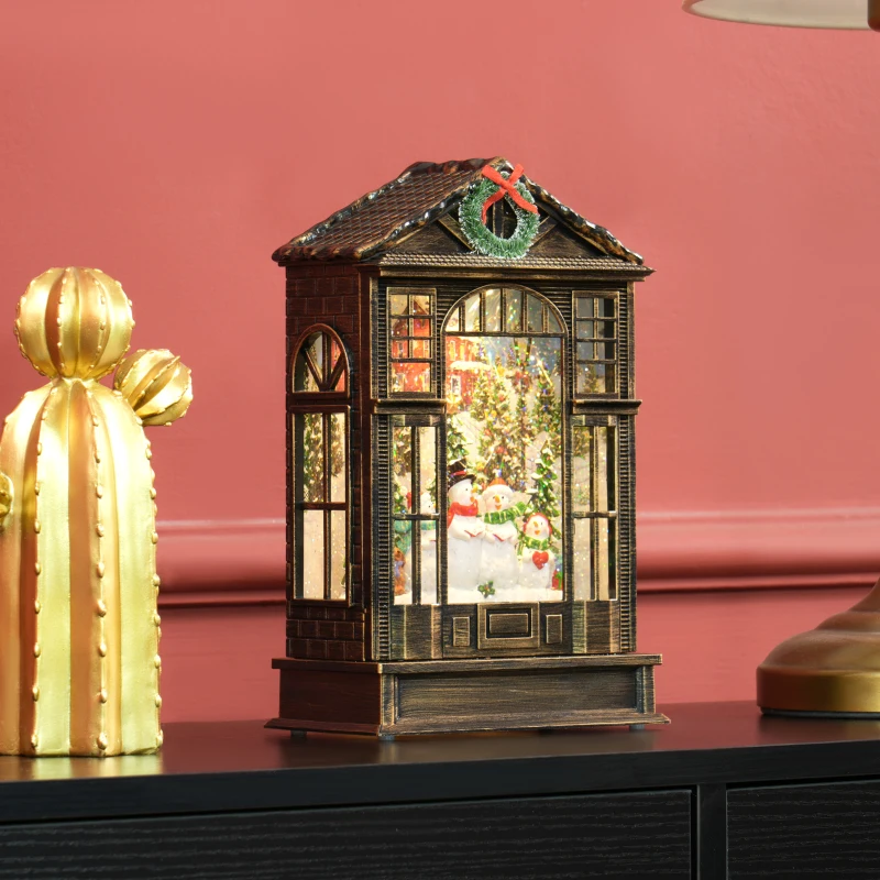 Snowman Christmas lighted decoration with frosted glass and holiday wreath.