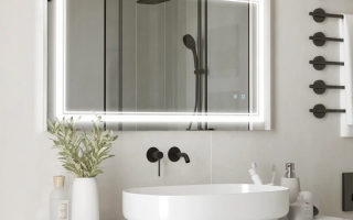 Modern LED bathroom mirror above sink and vanity.