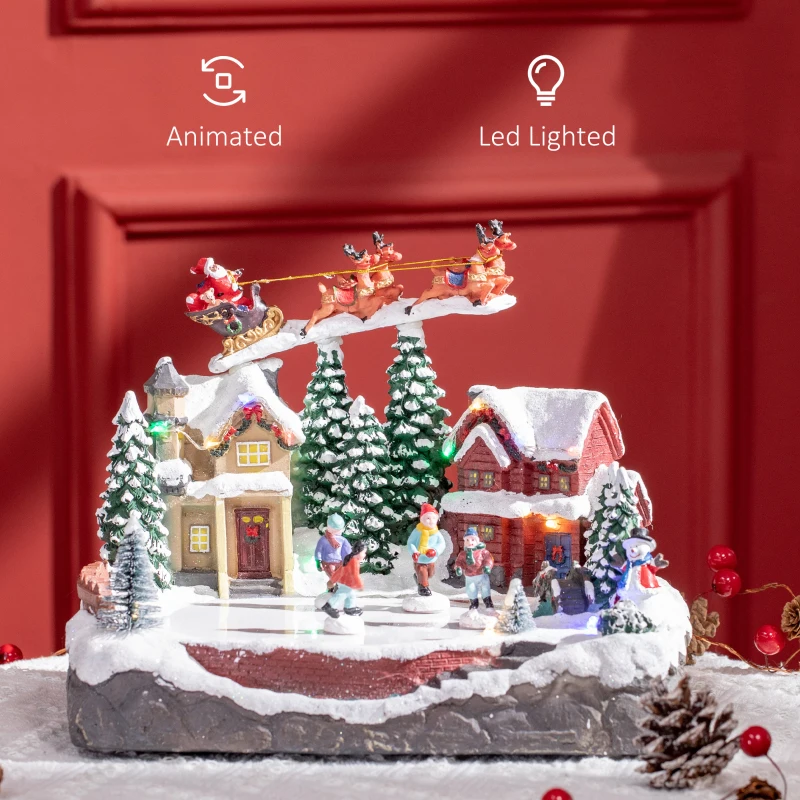 Animated Christmas village with Santa, reindeer, and LED houses.