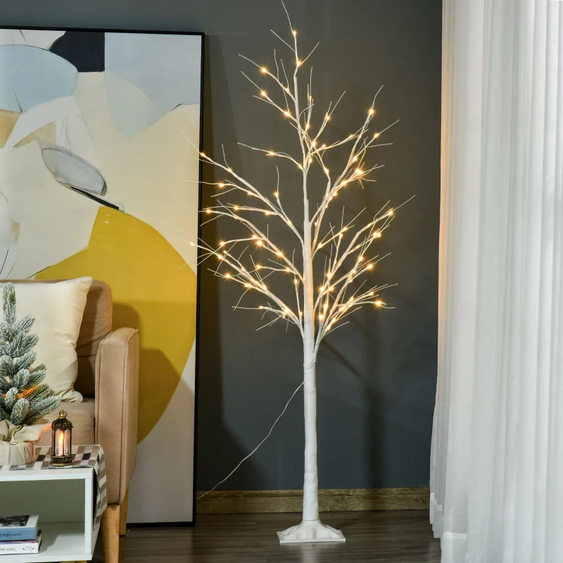 Indoor decorative birch tree with glowing warm LED lights.