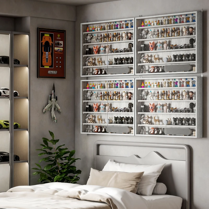 Gray sofa set with patterned rug and coffee table in a minimalist living room.
