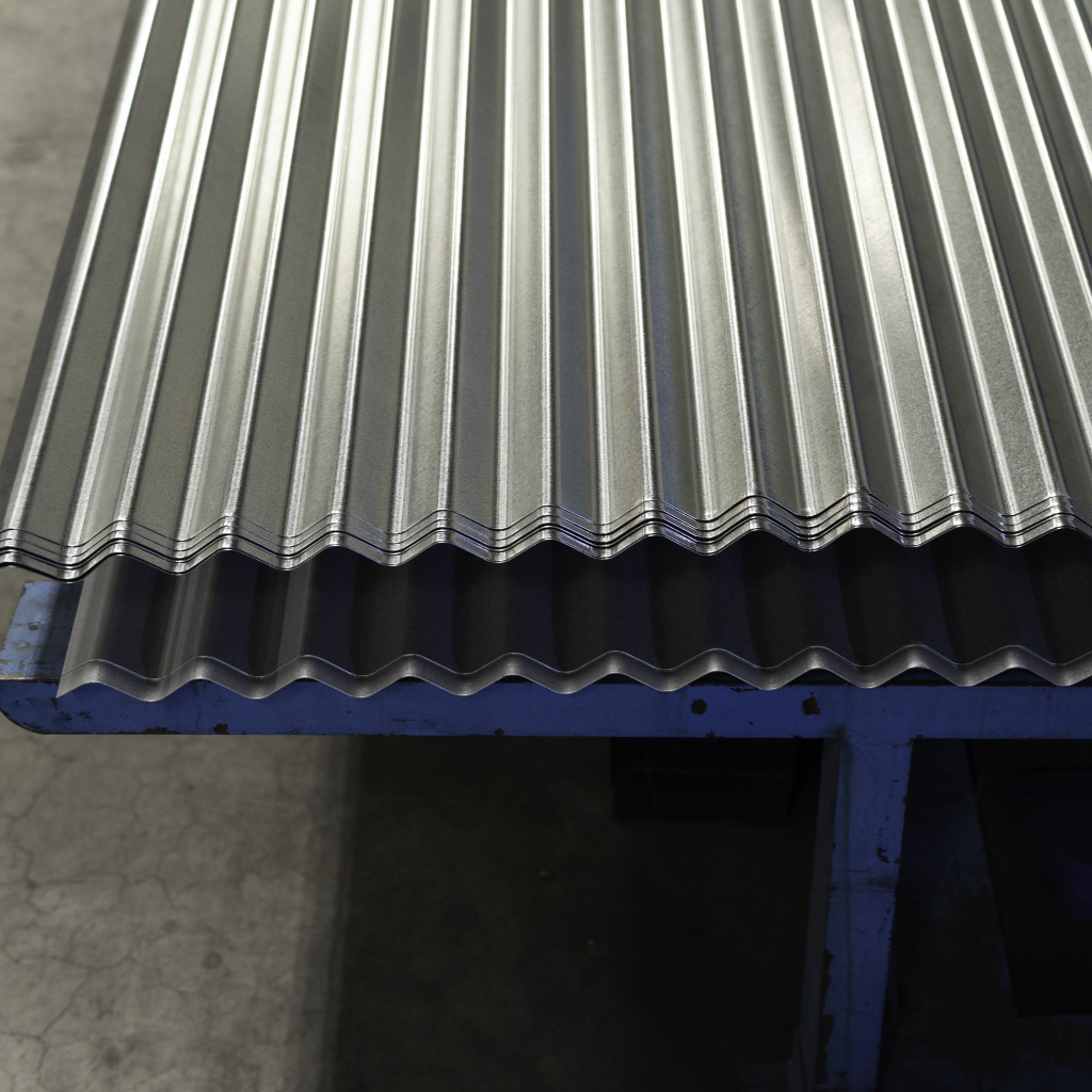 Corrugated metal roofing sheets stacked on workshop table
