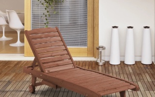 Finished wooden lounge chair placed on patio deck.