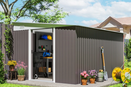 Large backyard metal shed with tools, plants, and garden decor.
