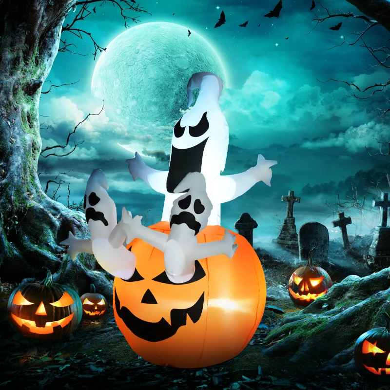 Inflatable jack-o’-lantern with three white ghosts glowing in graveyard scene.