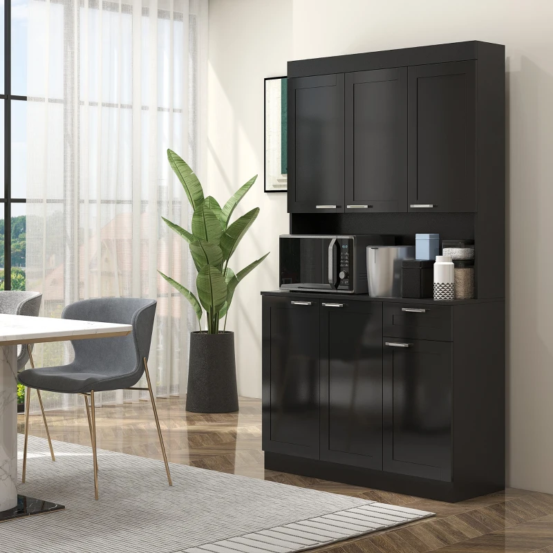 Black pantry cabinet with hutch, microwave, and storage jars in modern dining area.