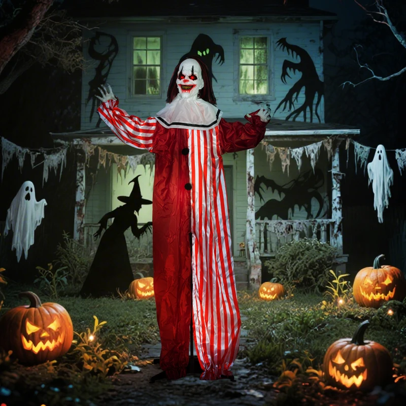 Red and white striped clown standing outside a haunted house decorated with pumpkins, ghosts, and eerie shadows.