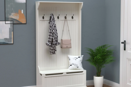 Assembled HOMCOM 3-in-1 hall tree with coat hooks and bench.