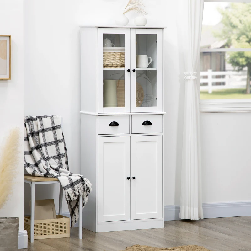 White pantry cabinet with glass display doors, lower cabinets, and drawers in a bright corner room.