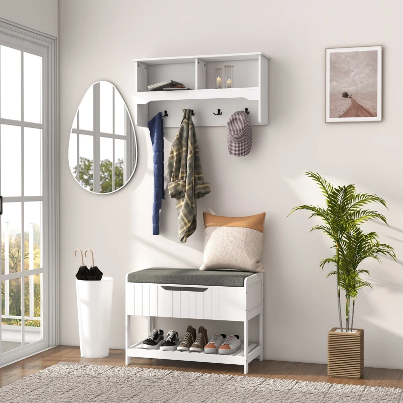  White hall tree with hooks, storage bench, mirror, and indoor plant in bright entryway.