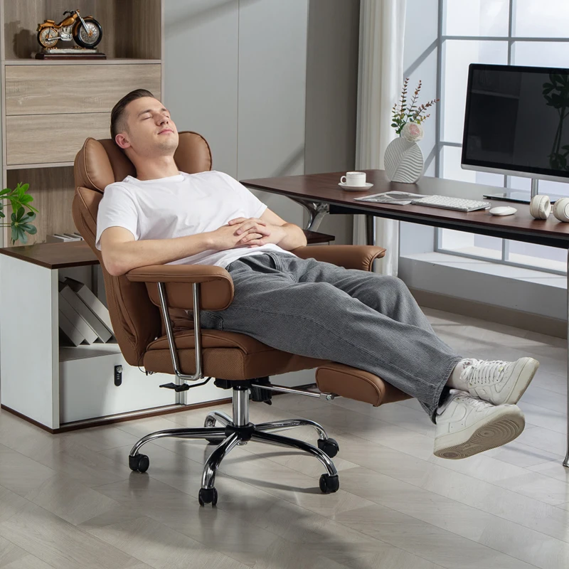 Man reclining on brown heavy-duty massage executive chair in office