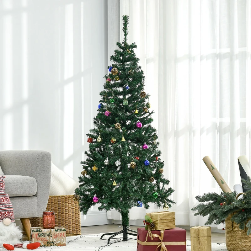 Artificial green Christmas tree with colorful hanging ornaments