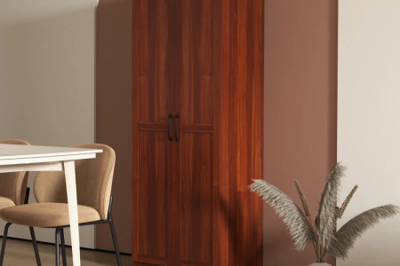 Tall wooden pantry cabinet with double doors in dining room