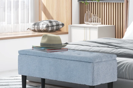 Modern bedroom with upholstered storage ottoman bench near bed