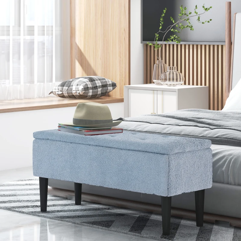 Modern bedroom with upholstered storage ottoman bench near bed