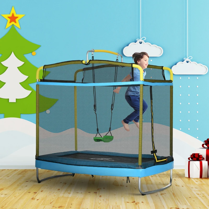 Child playing on blue trampoline with net, swing, and bar indoors