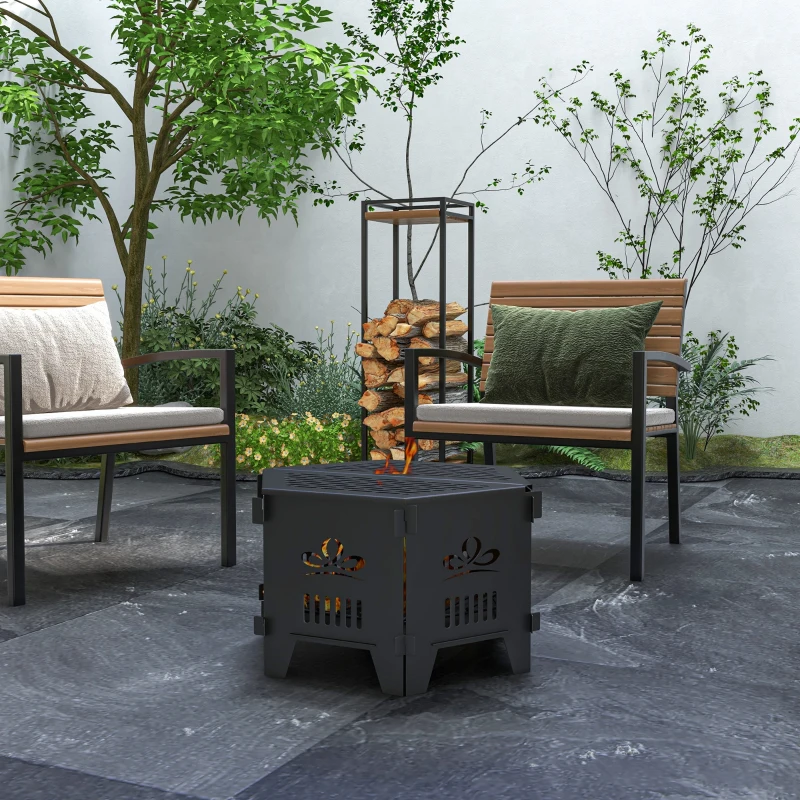 Hexagon metal fire pit surrounded by chairs in garden