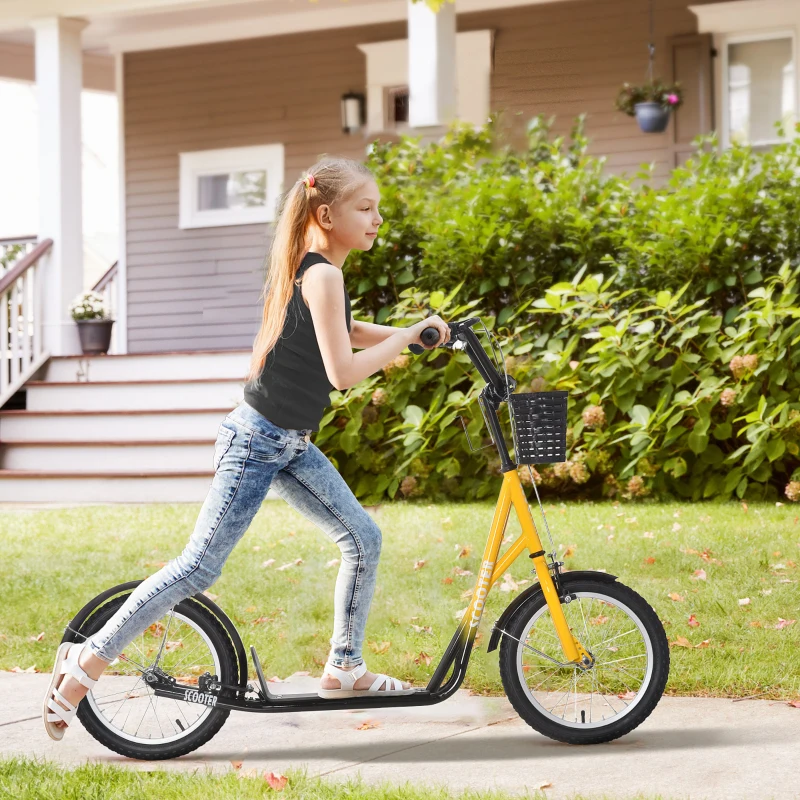 Girl riding bright orange kick scooter with basket in sunny yard.