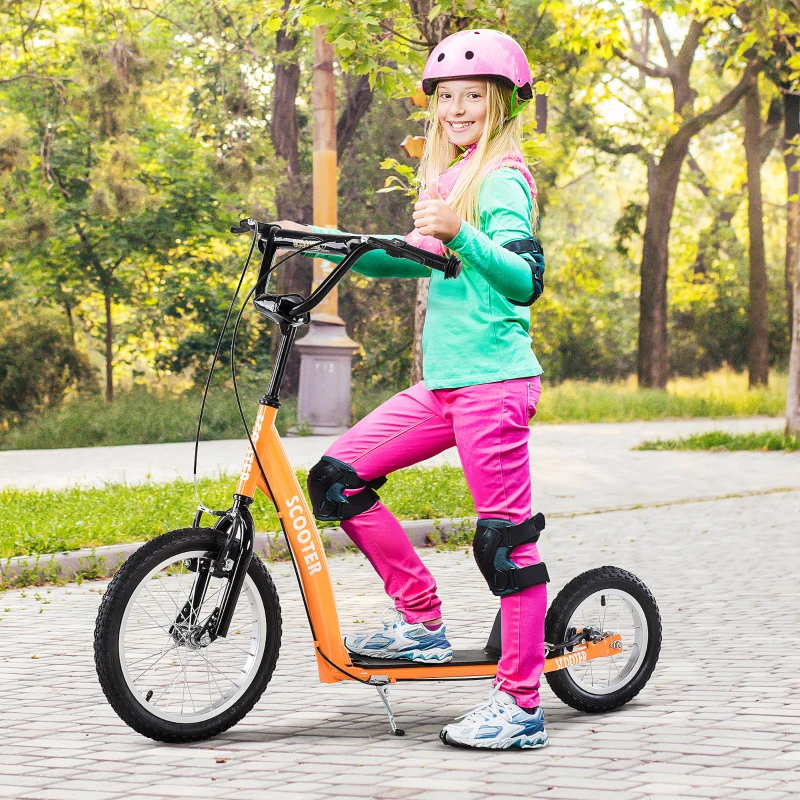 Smiling girl wearing pink helmet riding orange scooter on paved path.