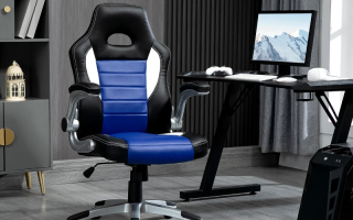 Sleek black ergonomic gaming chair setup with dual monitor desk
