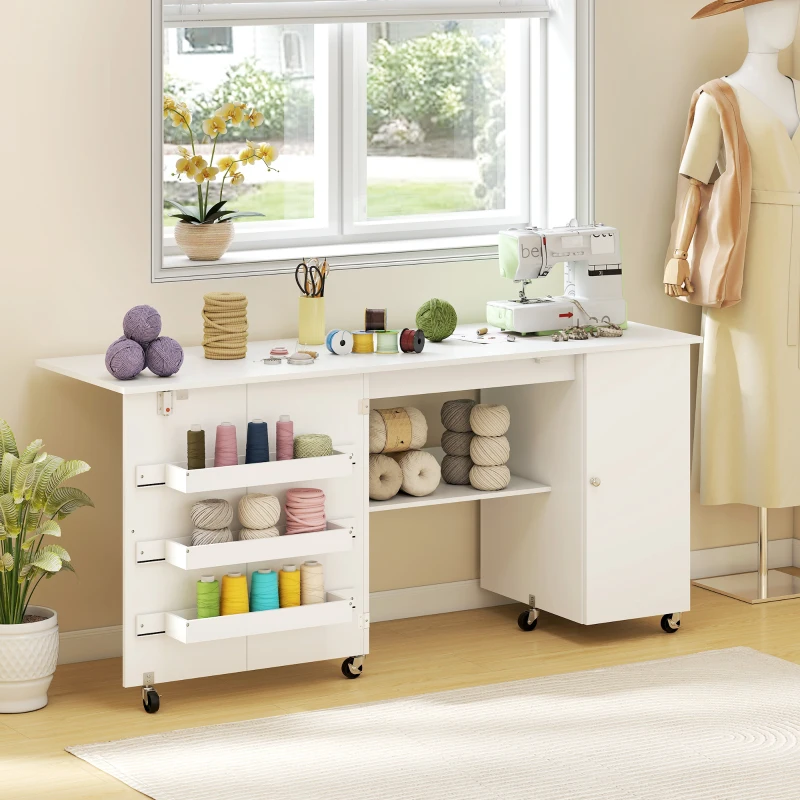 White folding sewing machine table with yarns and storage bins