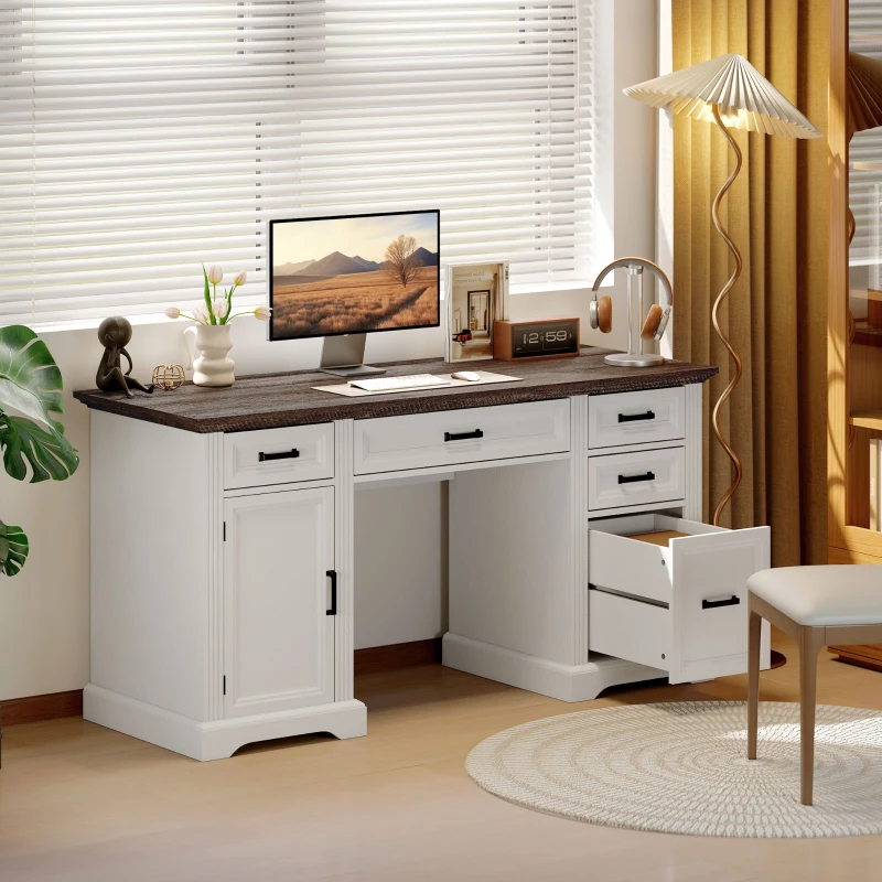 White writing desk with multiple drawers, monitor, and stylish workspace setup.