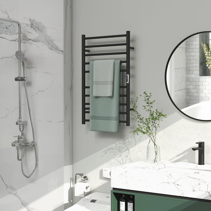 Bathroom with sleek black towel warmer and mirror above marble vanity