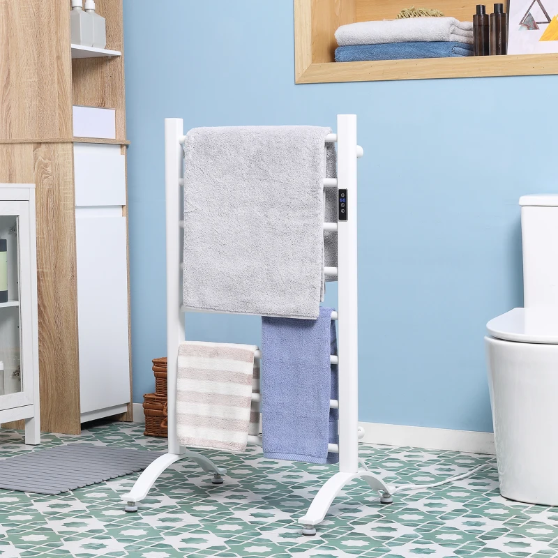 White freestanding towel warmer with soft towels in blue bathroom.
