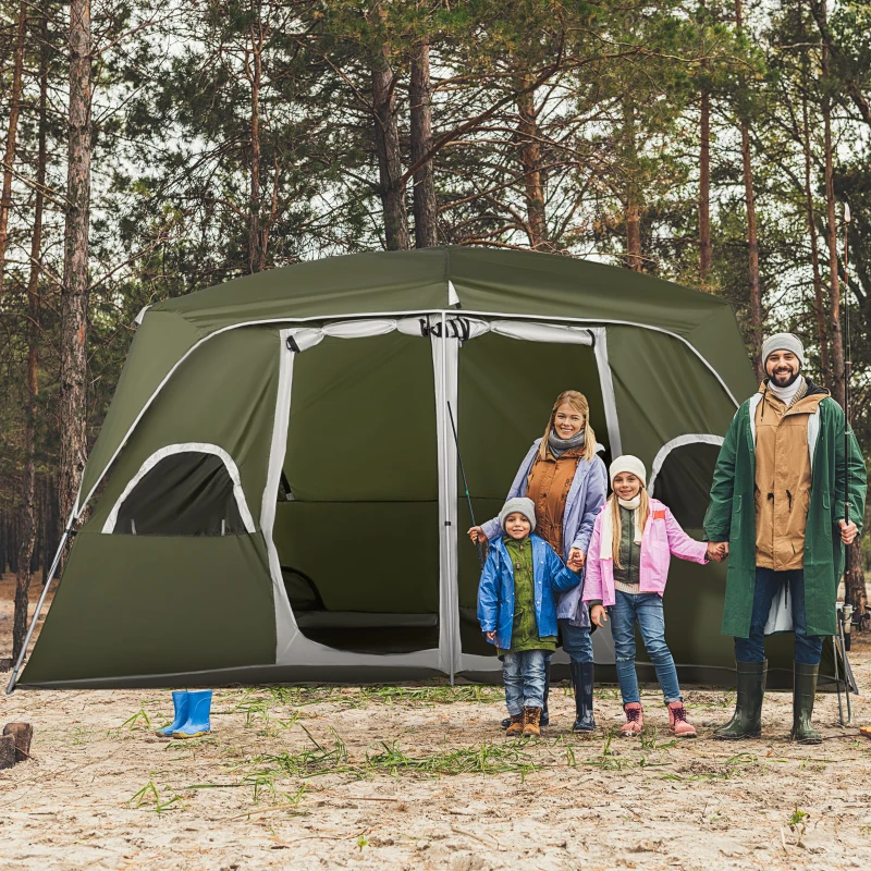 Green family camping tent with two mesh doors in open field.