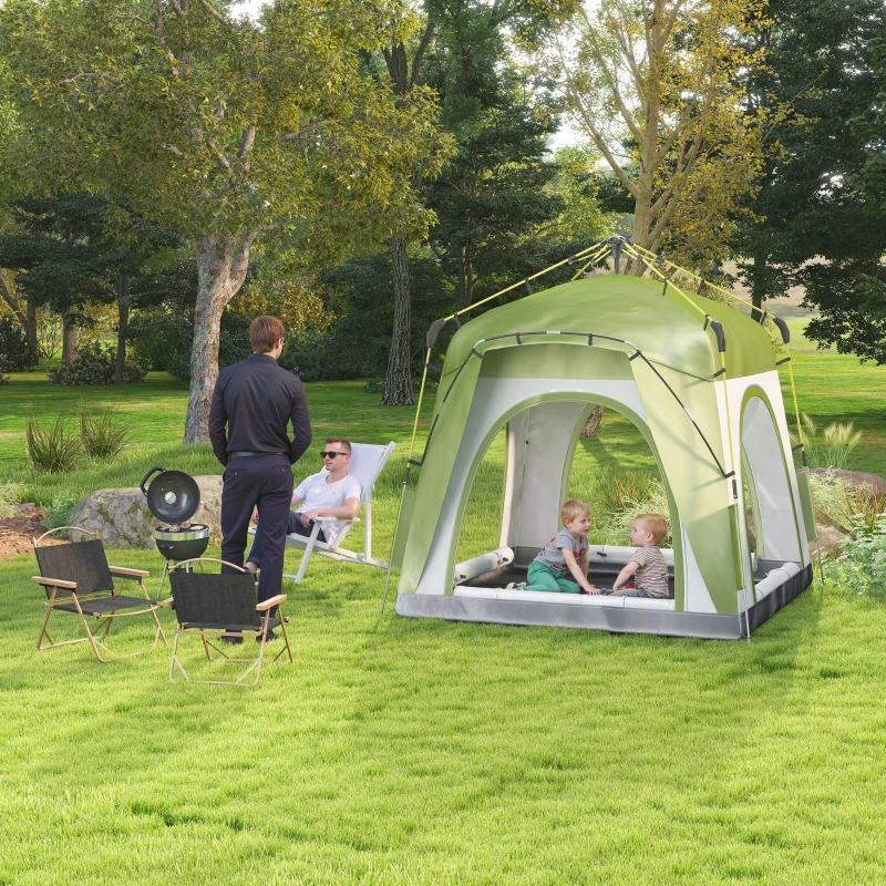 Yellow camping dome tent with family relaxing by lakeside.
