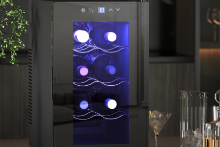 Modern wine cooler with blue LED lighting displaying wine bottles